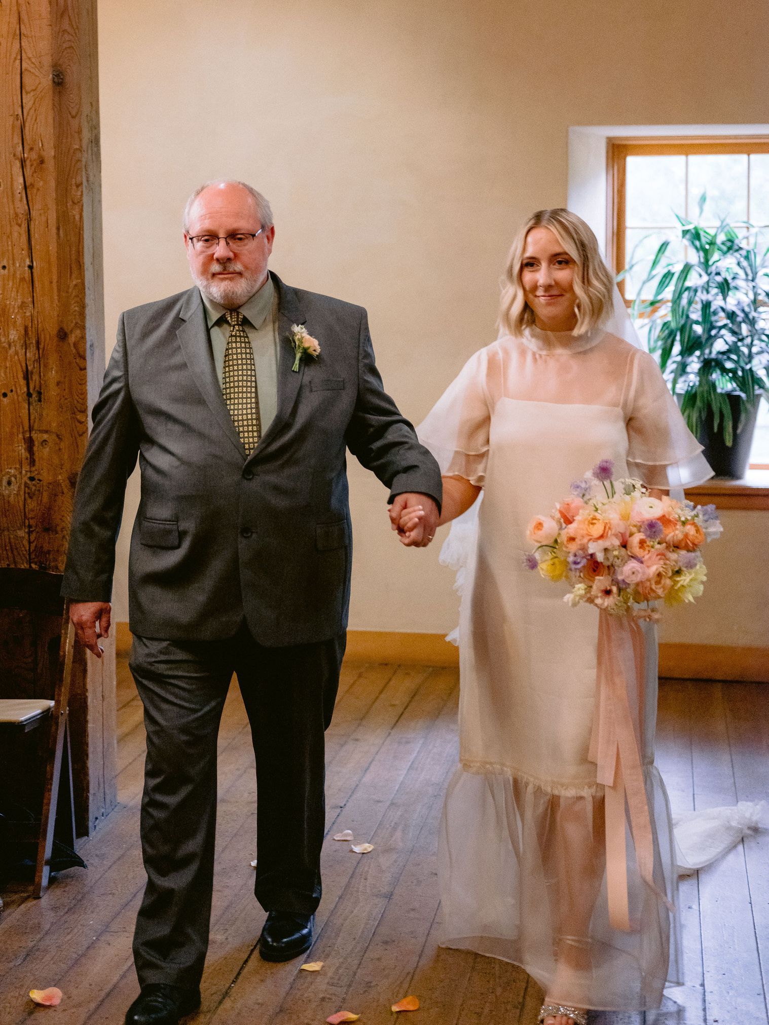 father walking bride down the aisle