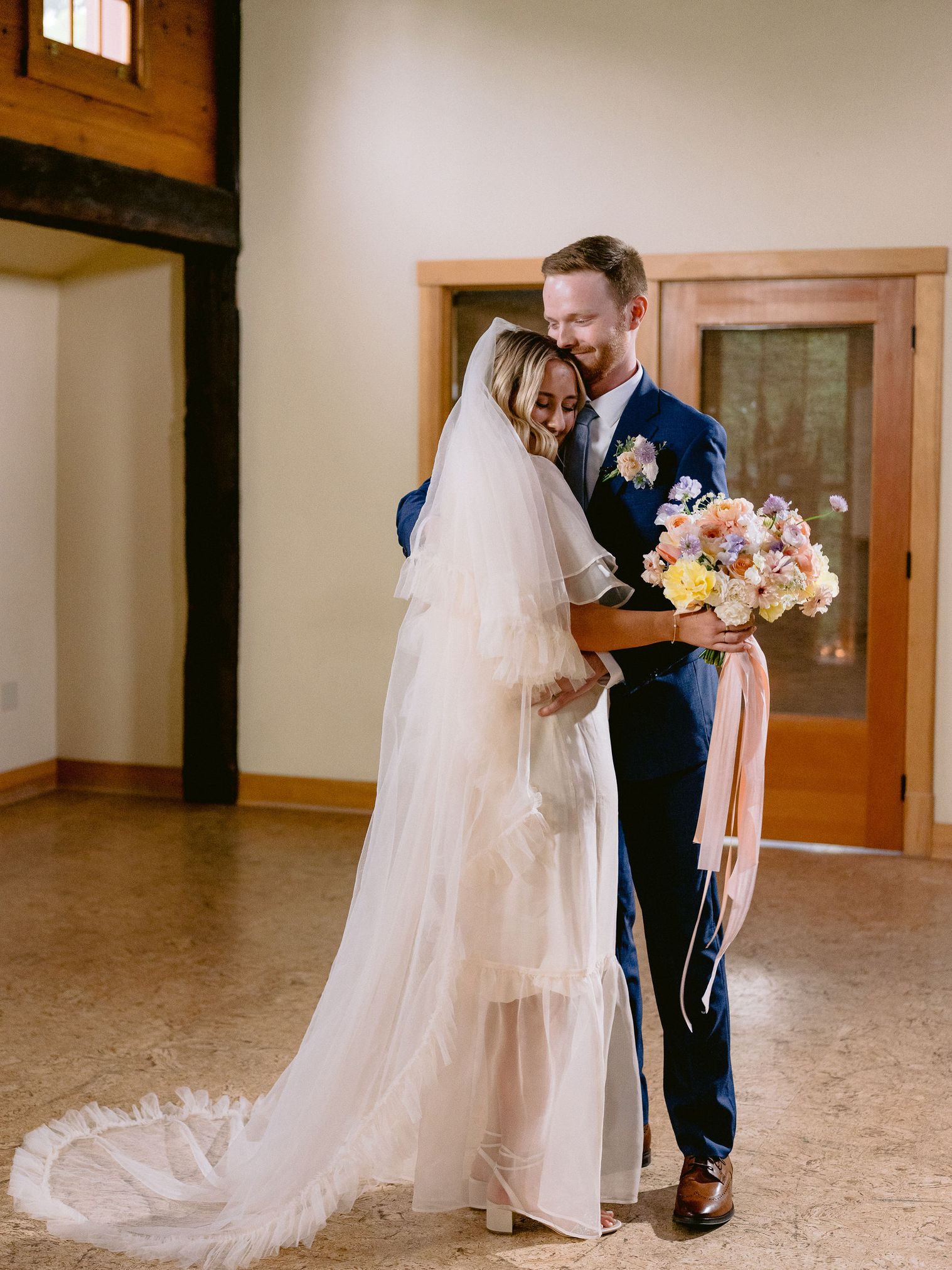 first look hug bride and groom