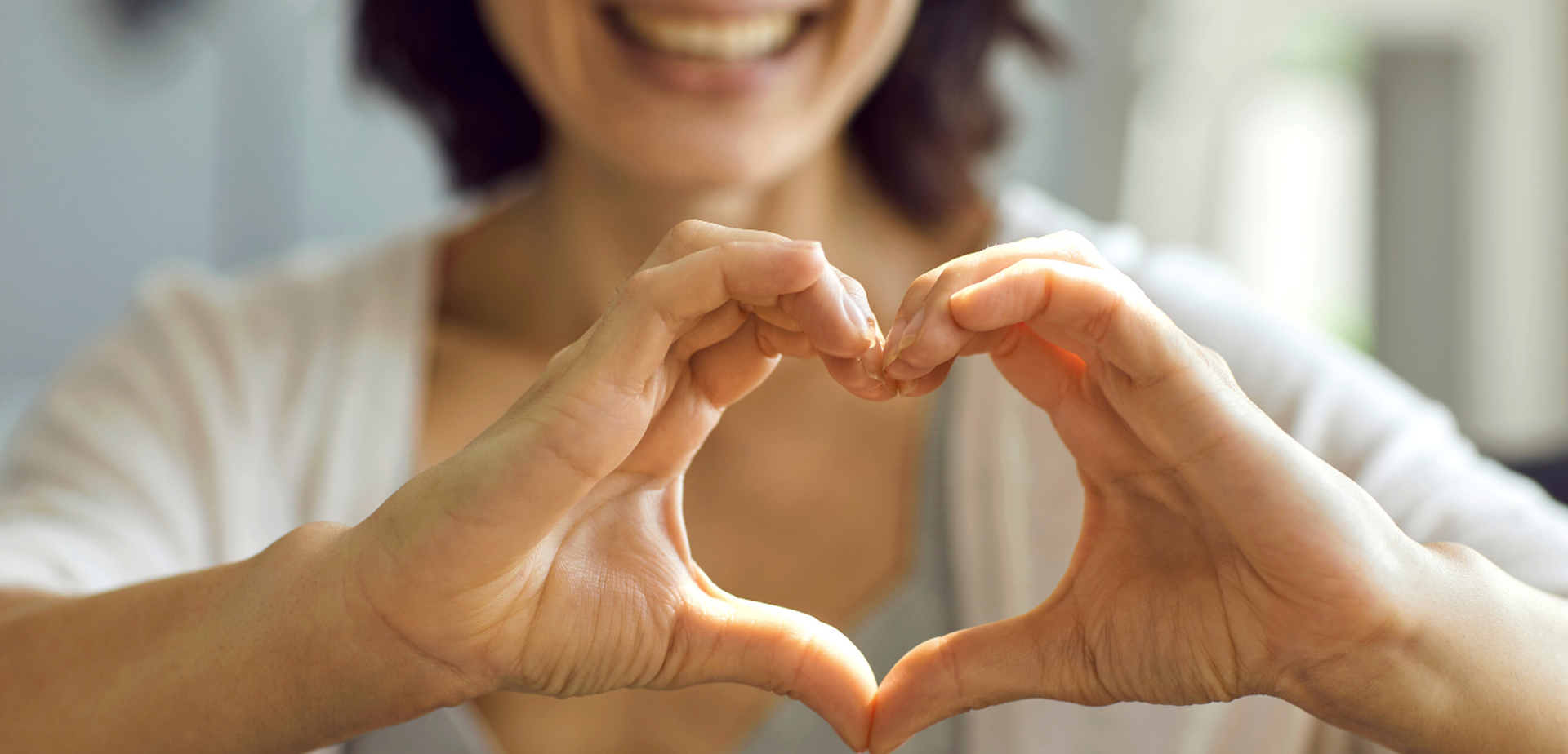 Woman making heart with her hands