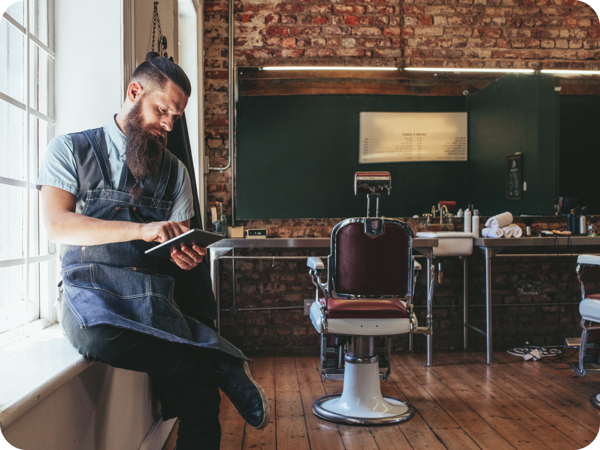 Barber waiting for a client