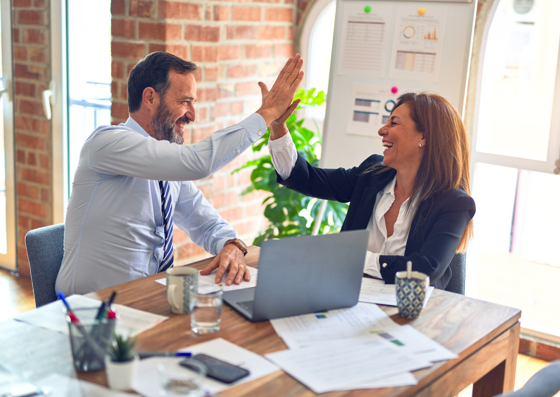 Work team, man and woman in the office