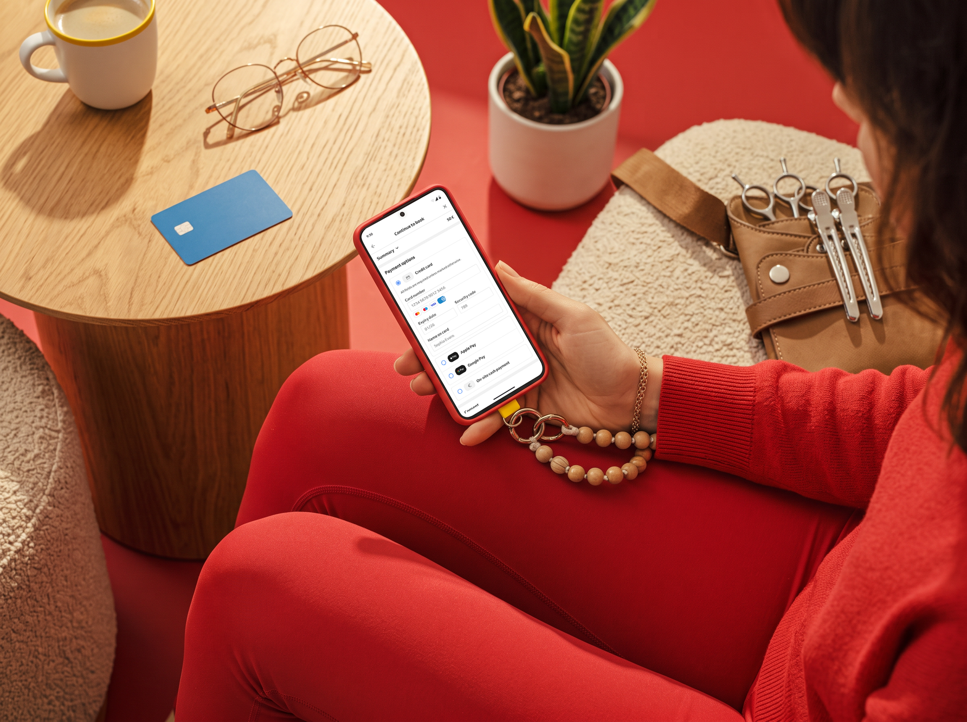 Client choosing a payment method for a salon appointment on their phone