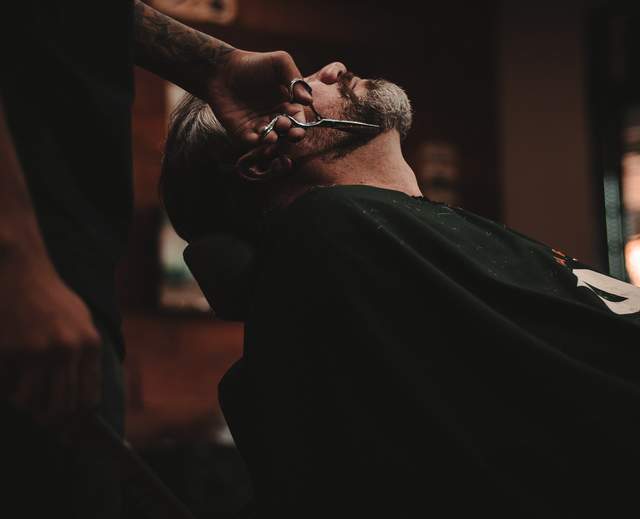 Barber with his client
