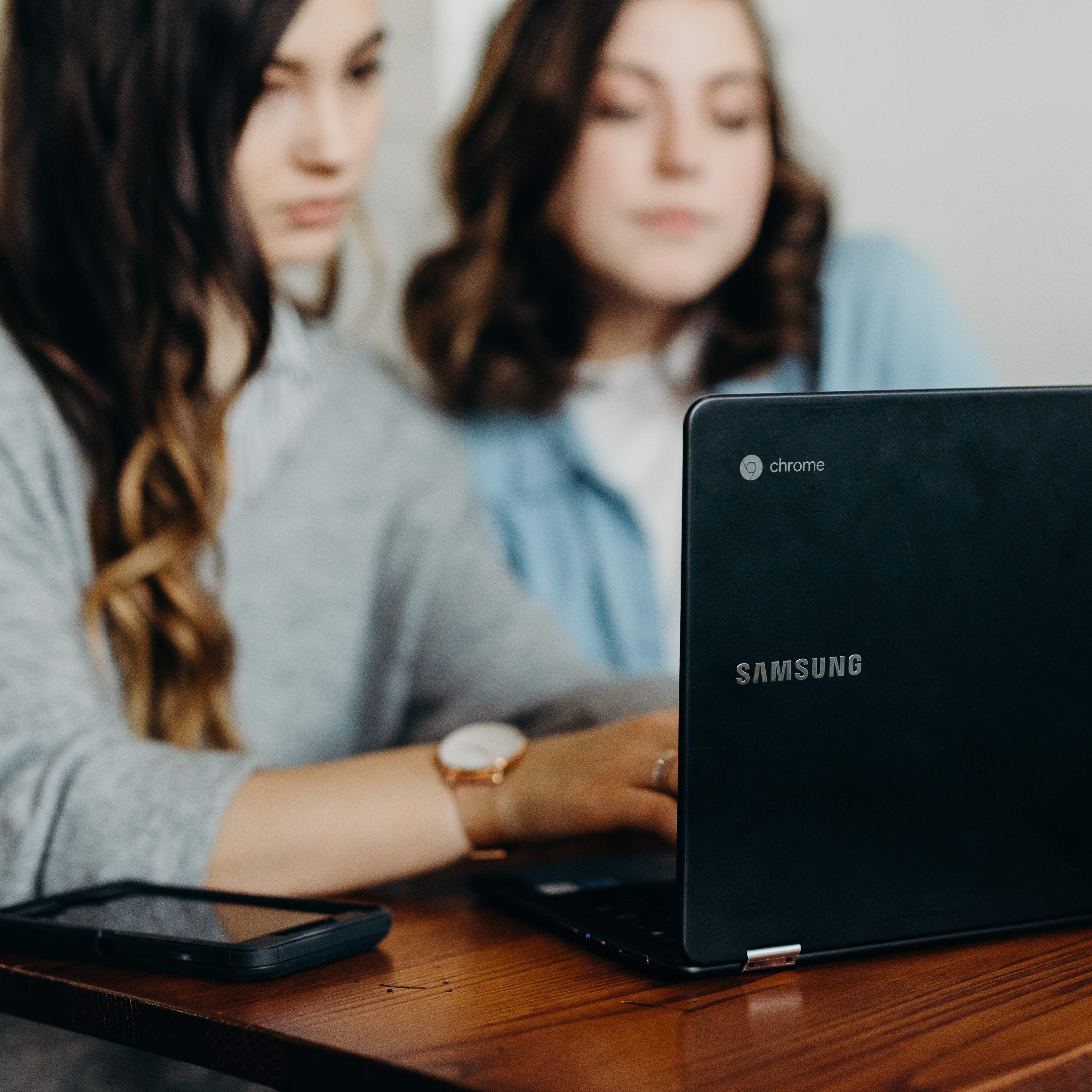 Two women with laptop