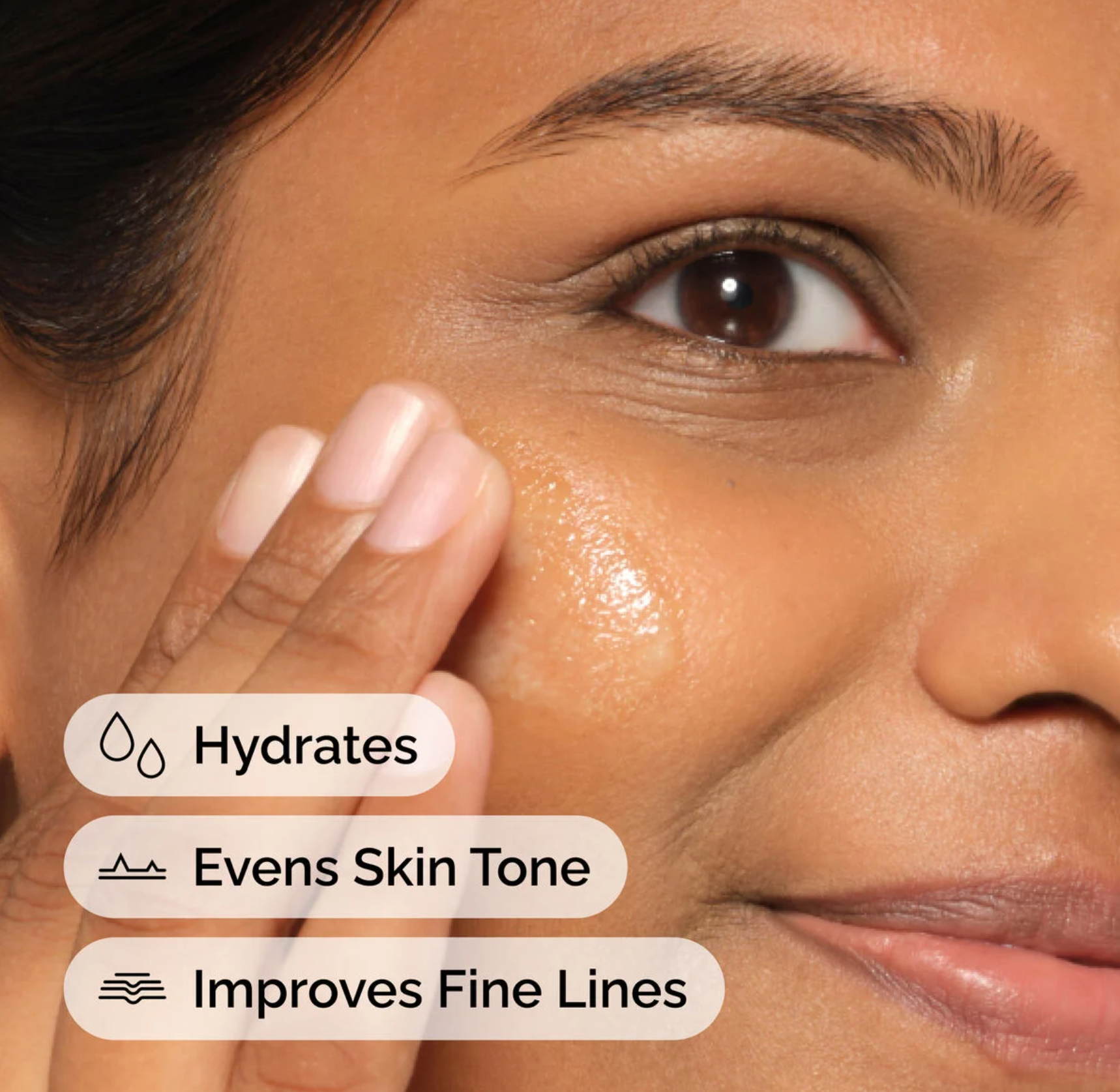 Woman applying The Ordinary Granactive Retinoid 2% Emulsion, demonstrating smoother skin and improved texture benefits